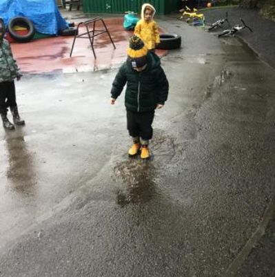 One example of a Nursery Passport Activity: Jumping in puddles